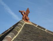 terracotta dragon finial blue sky
