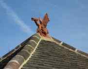 terracotta dragon finial blue sky