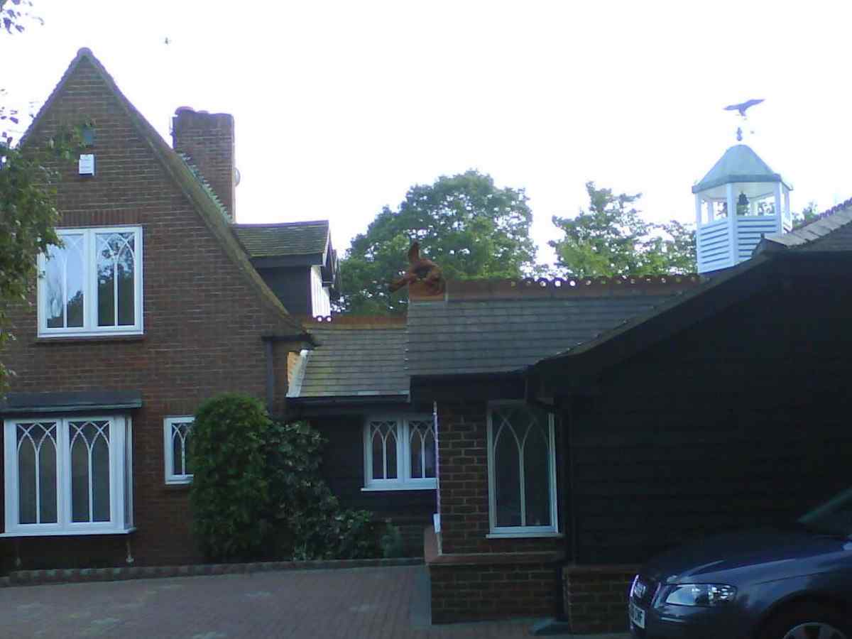 Ridge dragon installed on extension roof